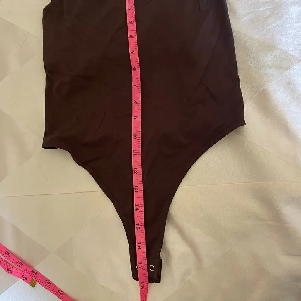 New Free people bodysuit chocolate color sz M/L